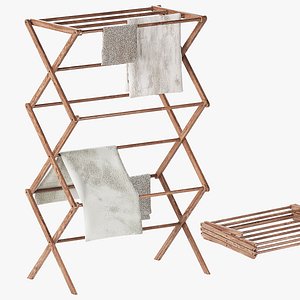 Folding drying rack Zara Home with towels
