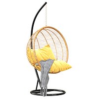 Un fauteuil oeuf suspendu au jardin