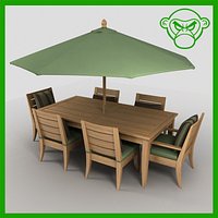 long table with chairs and umbrella