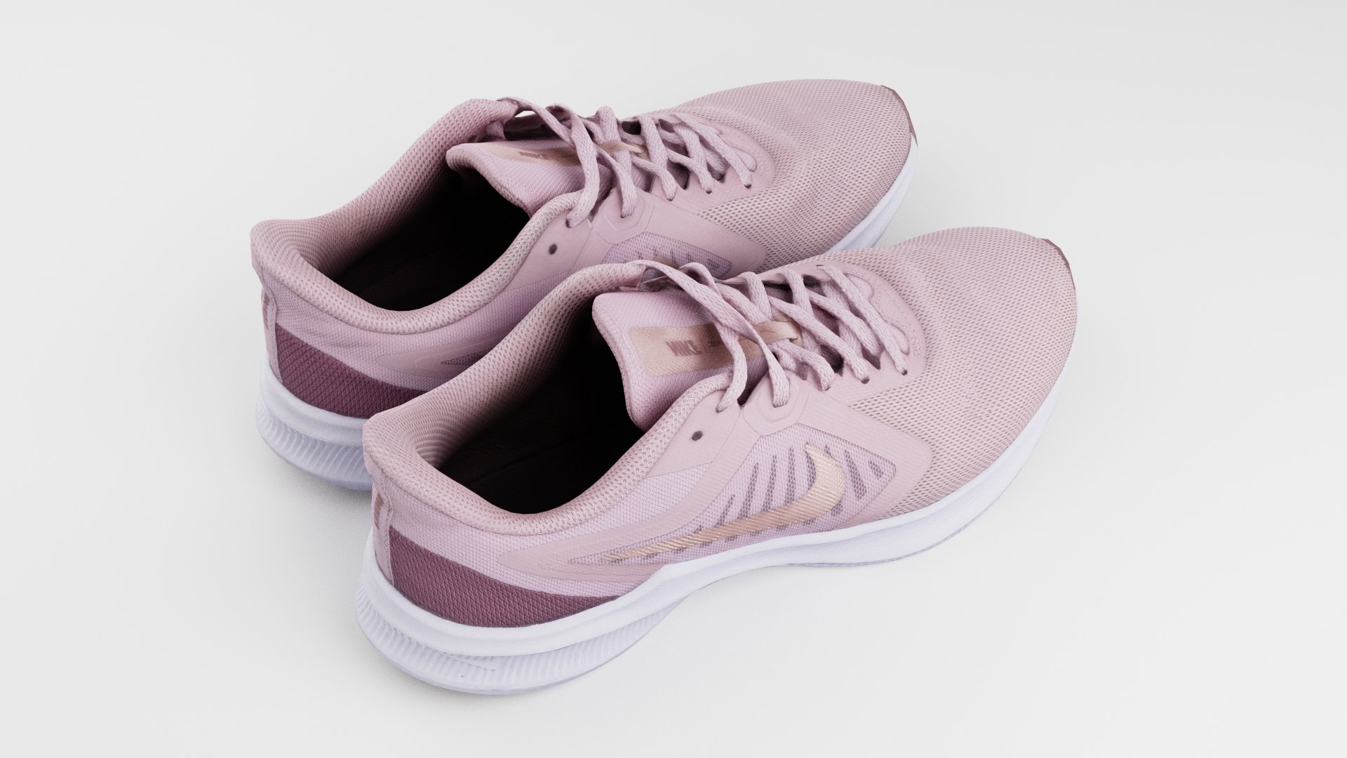 Pair of running womans shoes pink sneakers sport outdoor footwear 3D model https://p.turbosquid.com/ts-thumb/mE/6t5KVh/Sw/blenderdarkbread0003/jpg/1655665484/1920x1080/fit_q87/5873dda77daf802c1490048b917a04e30ae03182/blenderdarkbread0003.jpg