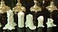 Conjunto de 133 modelos de castiçais, velas ornamentadas e esculturas de cera.