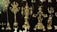 Conjunto de 133 modelos de castiçais, velas ornamentadas e esculturas de cera.