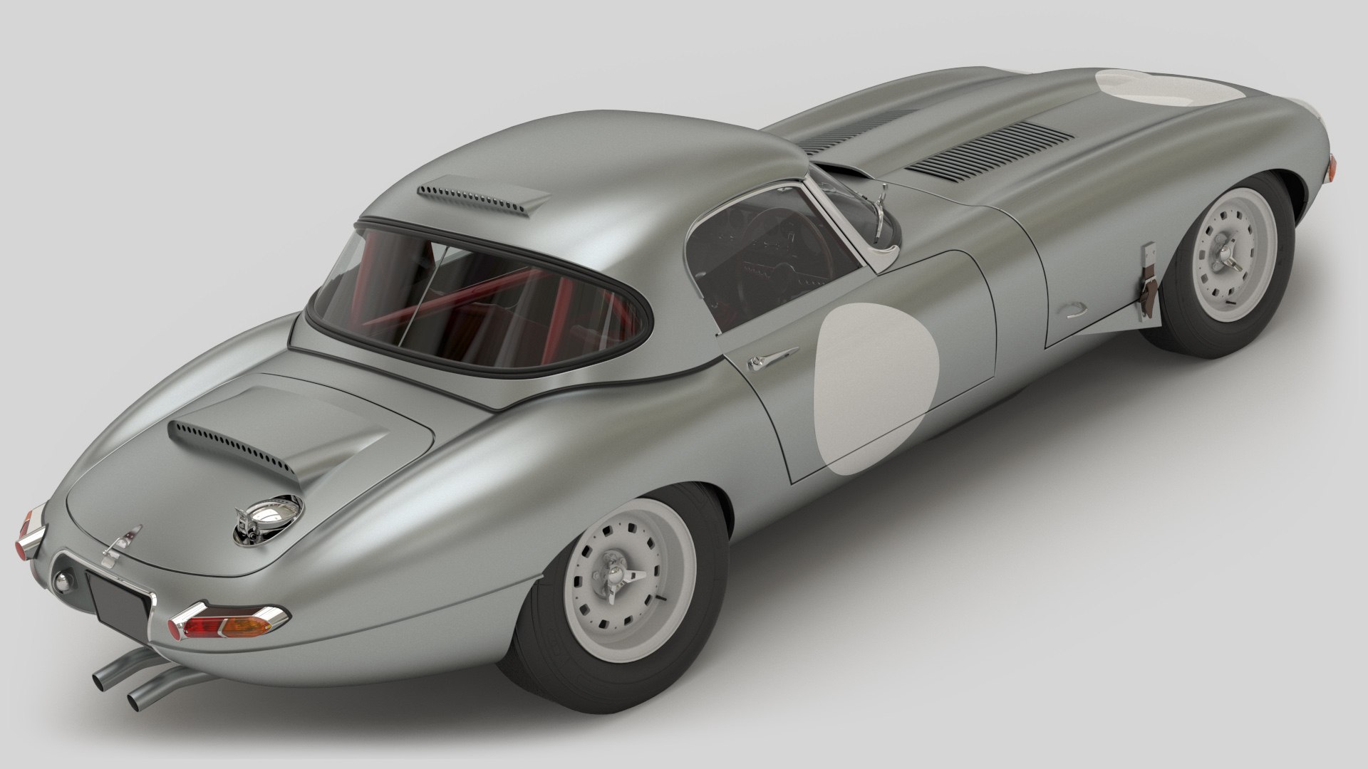 Jaguar E-Type Lightweight 1964 3D model https://p.turbosquid.com/ts-thumb/mc/QDAL15/dr/9/jpg/1666184177/1920x1080/fit_q87/6b5c06e98398e175a0d18715e47114efdf43c6ff/9.jpg
