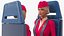 Stewardess Seated in Aircraft Crew Seat
