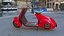 Roter Elektroroller Vespa 98 mit eingeschaltetem Licht geparkt