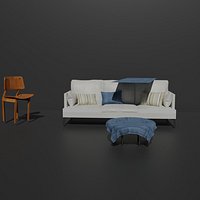 Sofa com almofadas e uma cadeira e com mesa de centro
