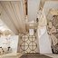 Scene of modern bathroom in gold and beige colors