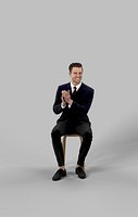 Business Sitting Man Virtue In A Black Suit Clapping