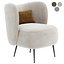 Tapicerowany fotel z oparciem typu Wingback