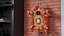 Orologio a cucù in legno rosso truccato