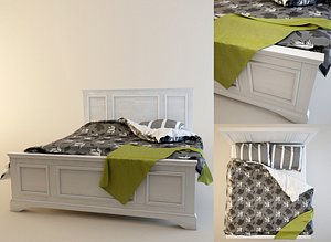 Bed with blanket & pillows