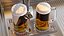 Torre de cerveza de acero inoxidable de cuatro grifos con jarras de cerveza