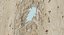 Bullet Hole Through Plywood