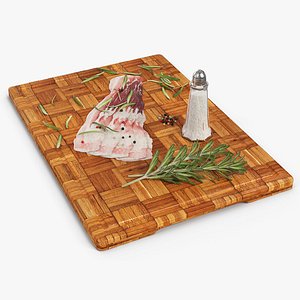 Uncooked Pork Bacon on Cutting Board