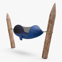 Survival Hammock Attached to Wooden Stakes