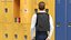 Posa in piedi di vestiti della scuola dell'adolescente