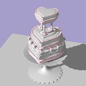 heart shaped cake with three tiers and flowers