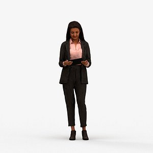 00228Yawan0017 - Adult Indian woman holding tablet in office wearing transitional seasonal attire