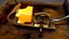 Old worn mousetrap with cheese