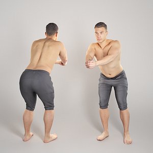 Athletic man playing beach volleyball 145
