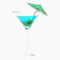 Martini glass with olive and umbrella