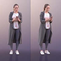 10570 Rocio - Woman Standing Texting With Phone