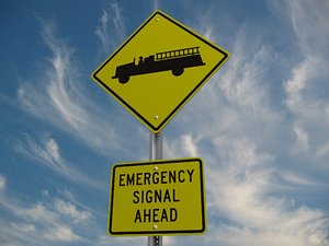 Emergency Vehicle Crossing Road Sign