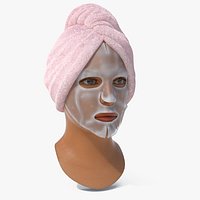 Cosmetic Face Mask on Face with Pink Towel Fur