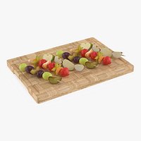 Wooden Skewers with Fruit on Board