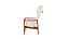 Sillón grande de estilo Mid Century con respaldo alto, diseñado por Ib Kofod-Larsen, Dinamarca, 1950.