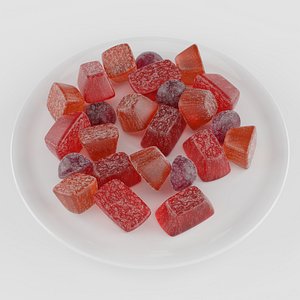 Red, orange and cherry marmalade gumdrops on a ceramic plate