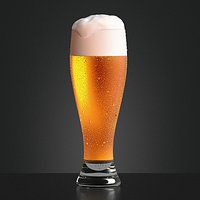 Beer Glass on dark background - drinking glas with drops