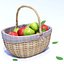 Cesta de mimbre con manzanas