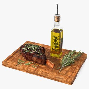 Wooden Board with Meat and Rosemary Oil
